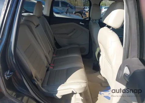 2016 Ford Escape Titanium z USA, uszkodzony, nr VIN 1FMCU0J92GUB43545